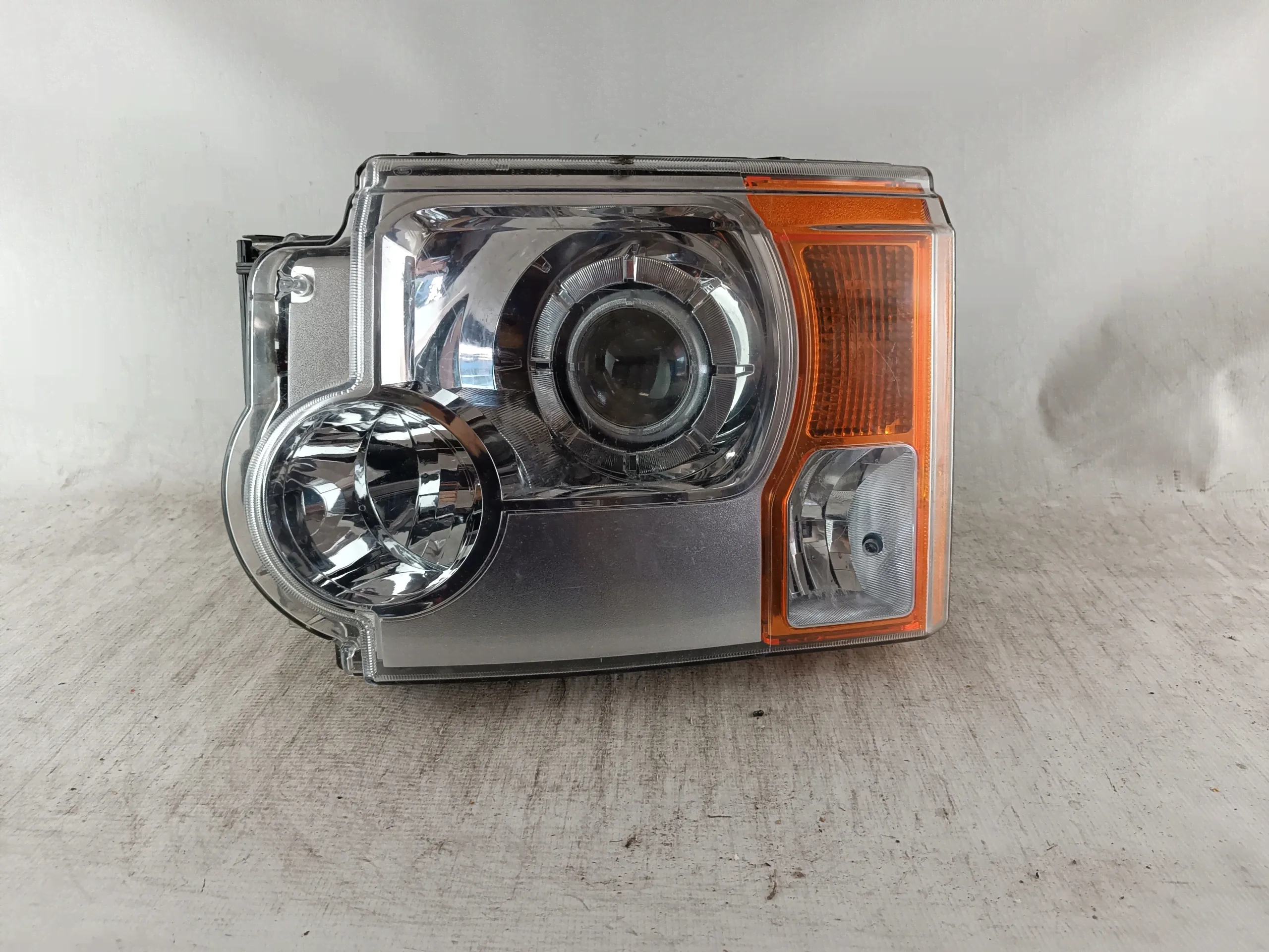 Фара левая Land-Rover Discovery 3 поколение (2004-2009), 6184365